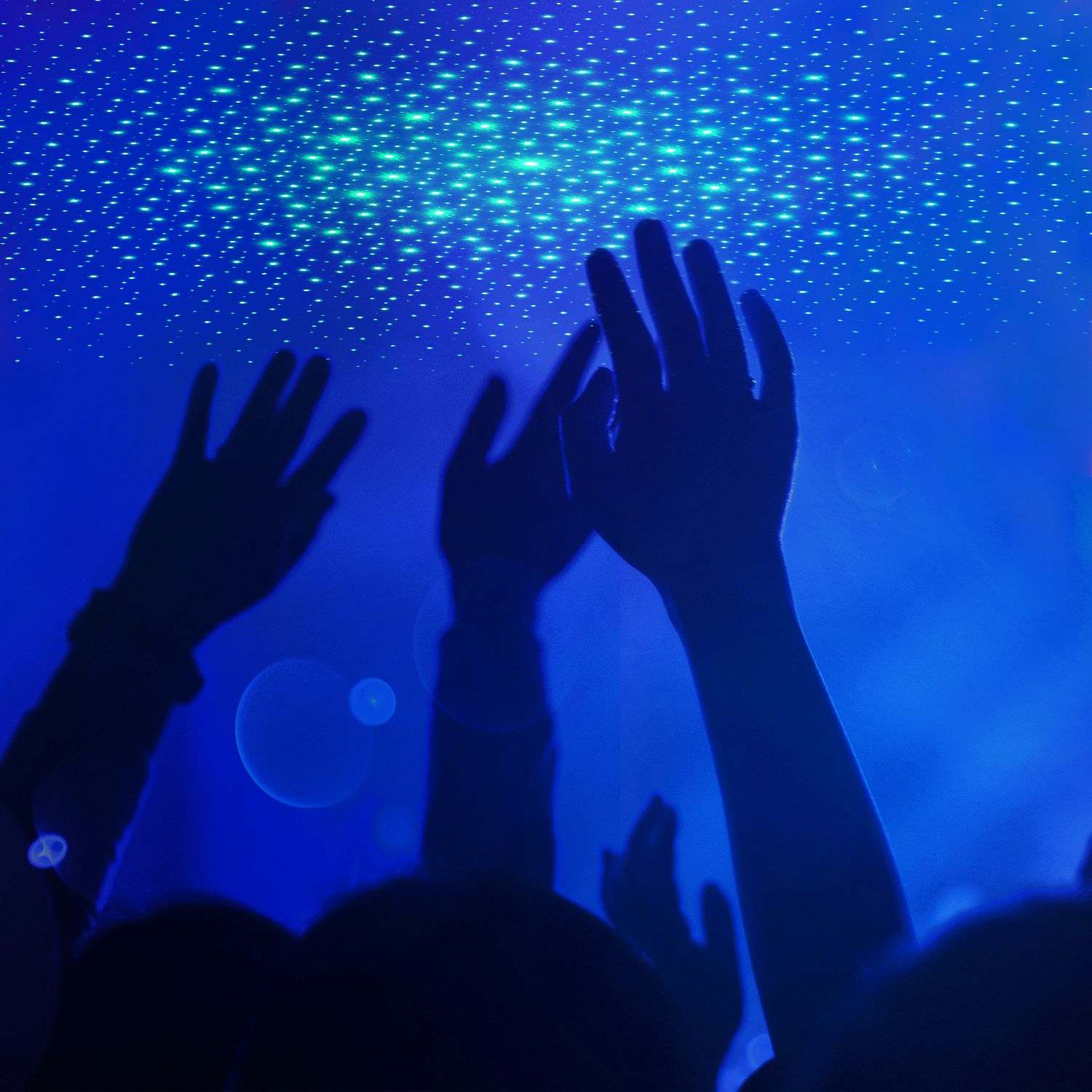 Green laser pointer starry night ambient projection